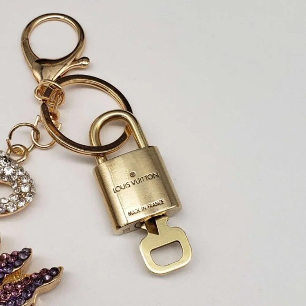 Authentic Louis Vuitton Padlock & Key Gold ✨Unbranded Swan Bag Charm Keychain